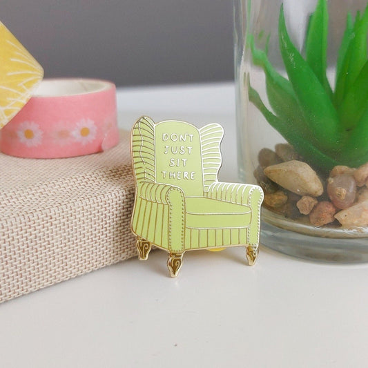Don't Just Sit There Chair Enamel Pin